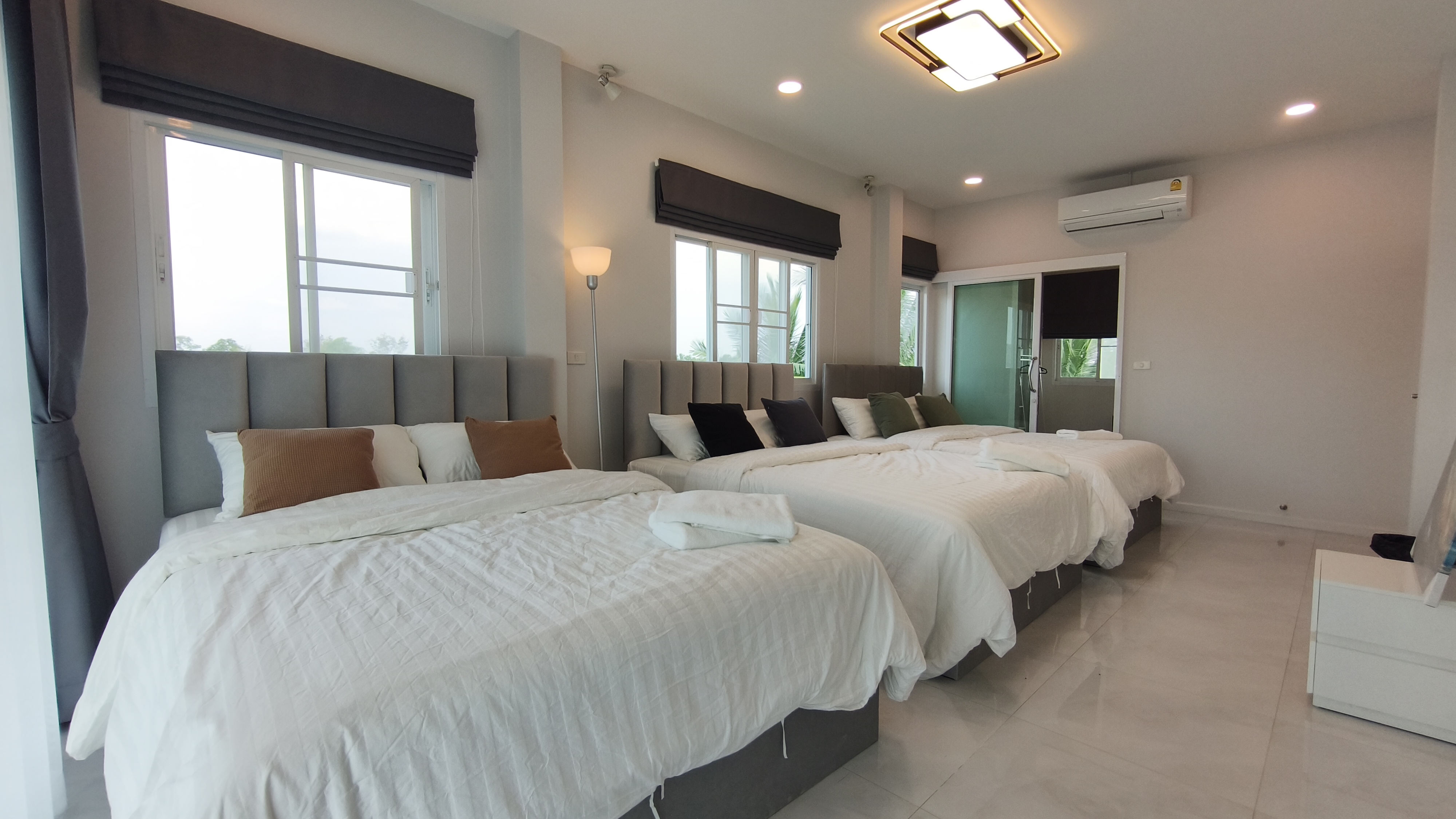 Cozy bedroom with king size bed and warm lighting